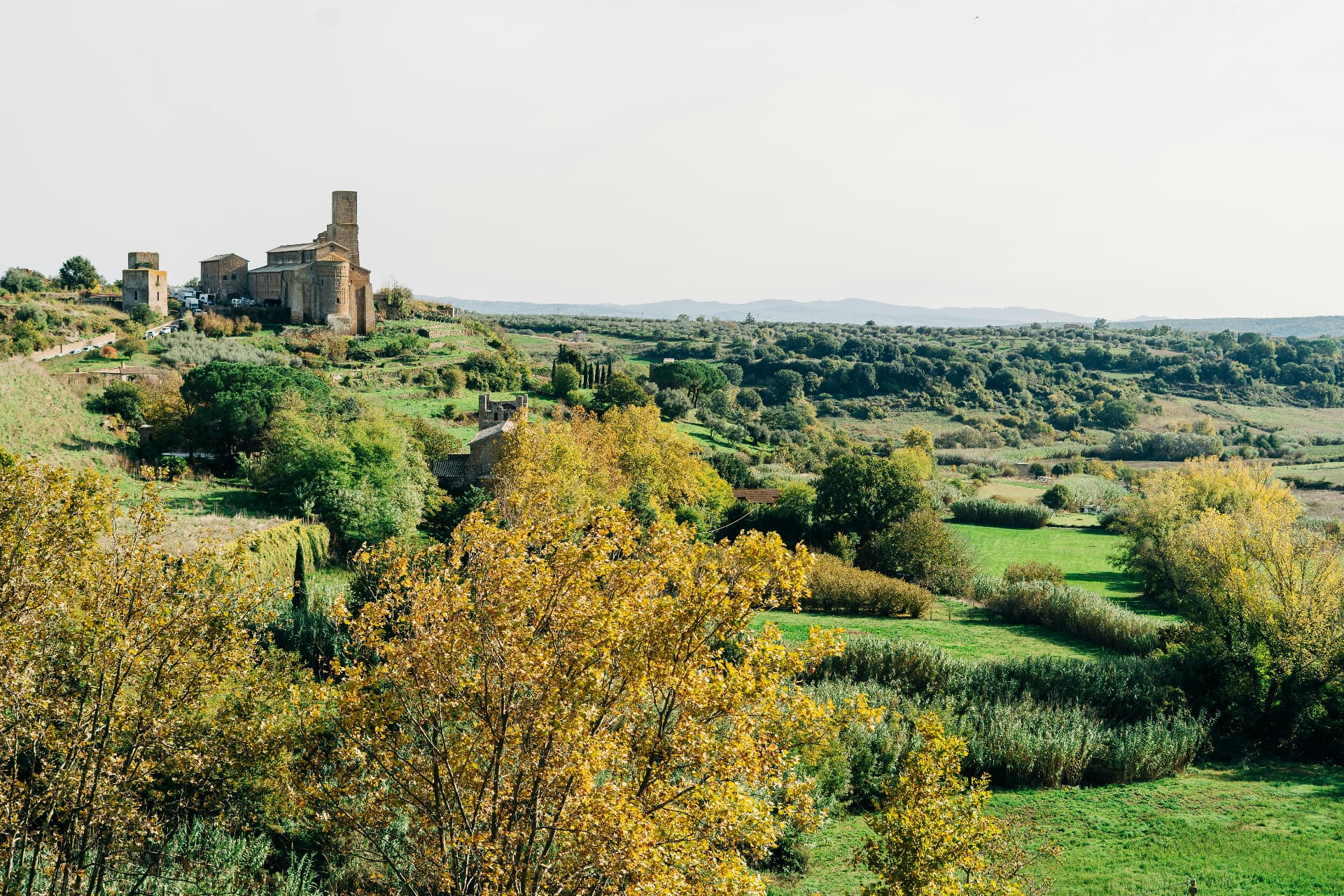 San Pietro in Tuscania on its hill above the autumn valley