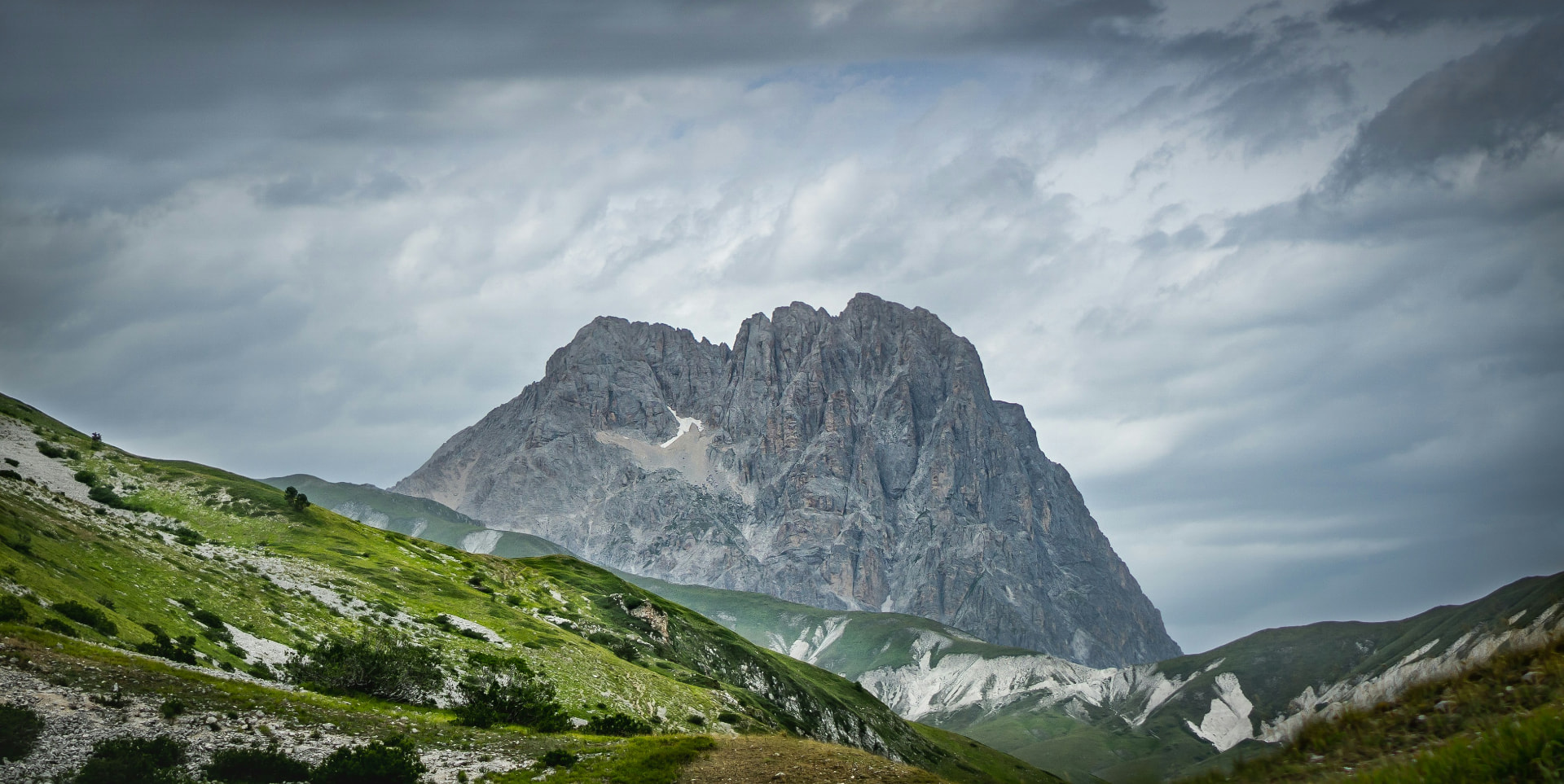 The rocky massif of the Gran Sasso under a dramatic sky