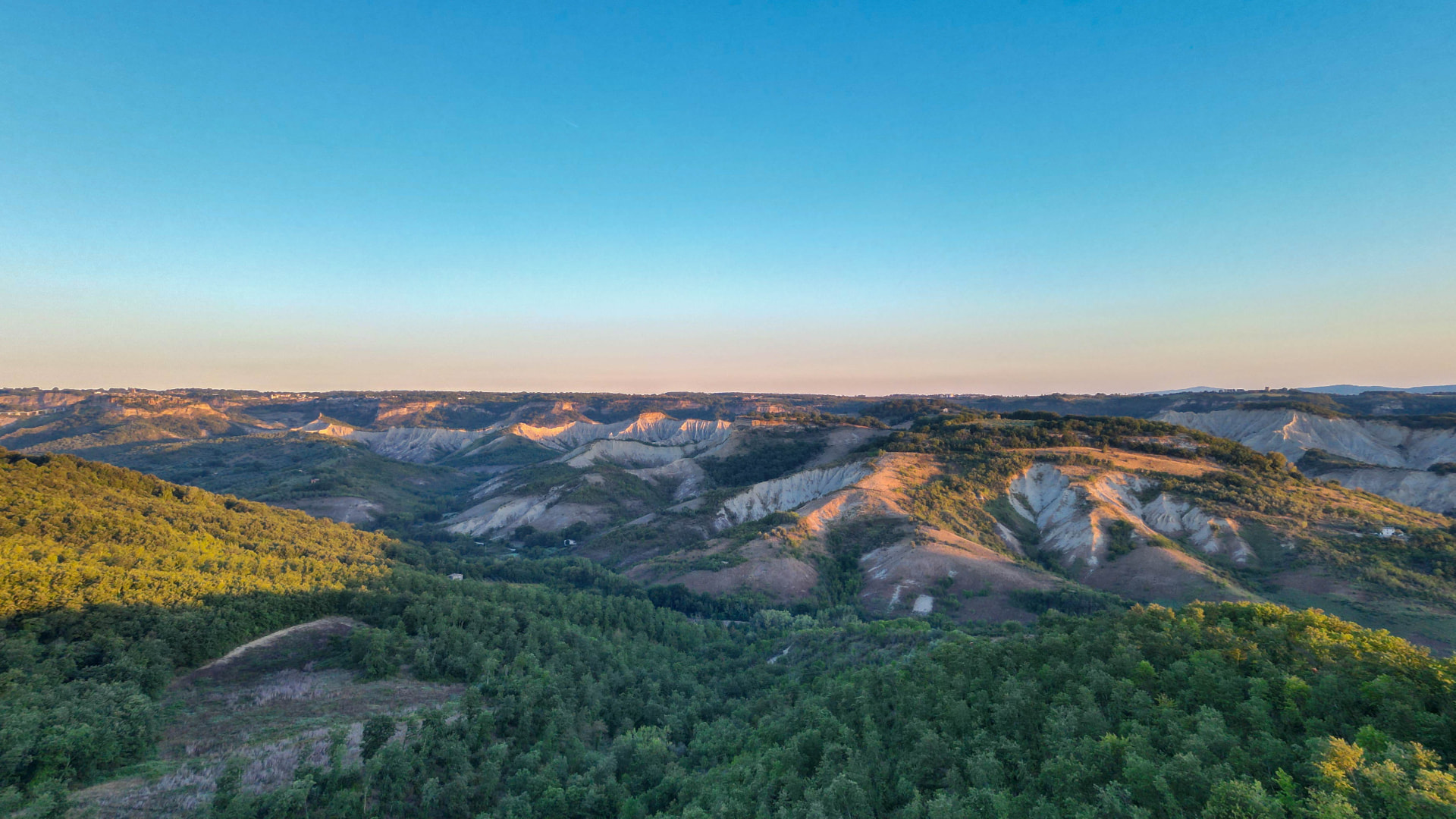 Aerial view over the Tuscia hills at golden hour