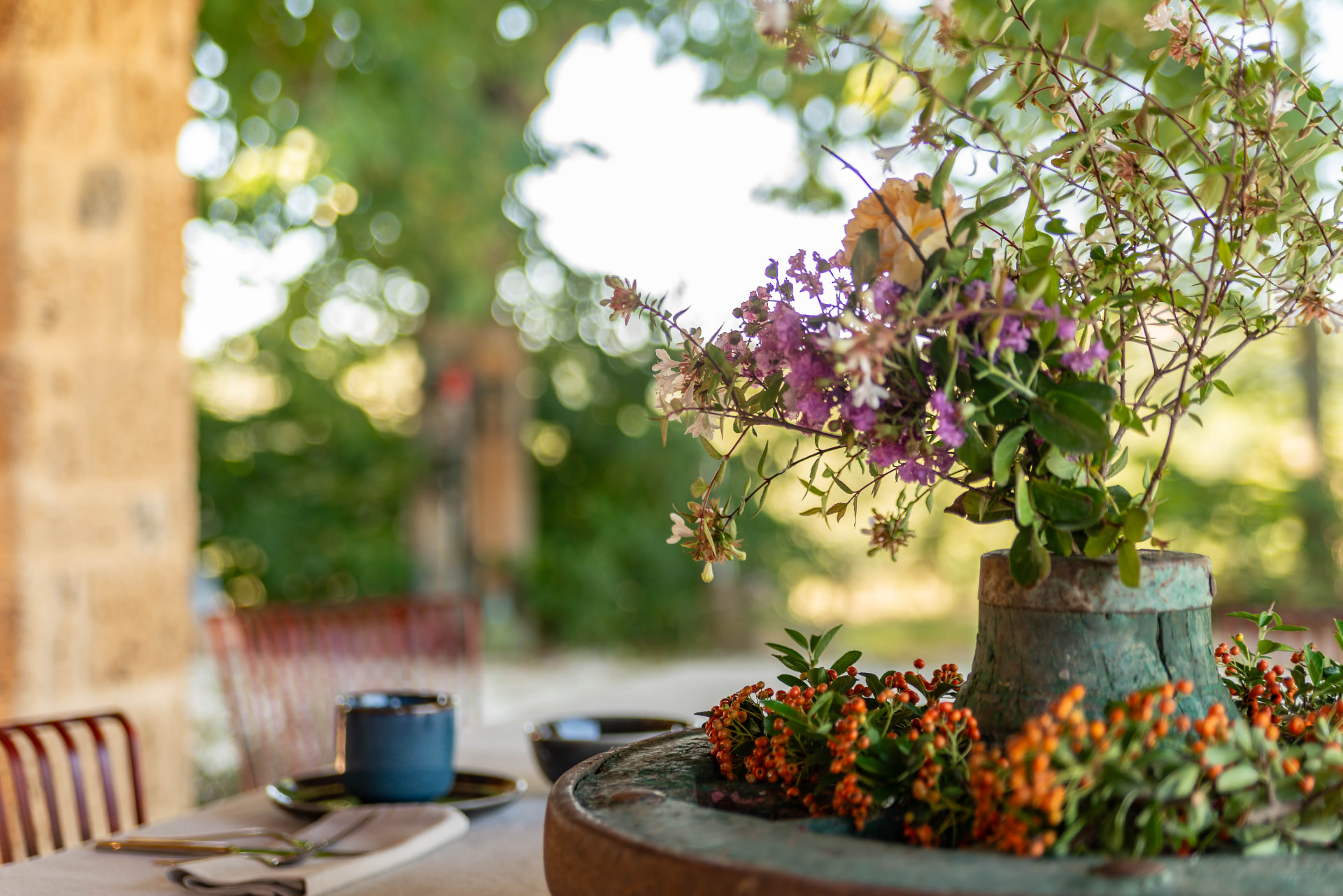 Flowers in the original cart-wheel centrepiece on the breakfast table