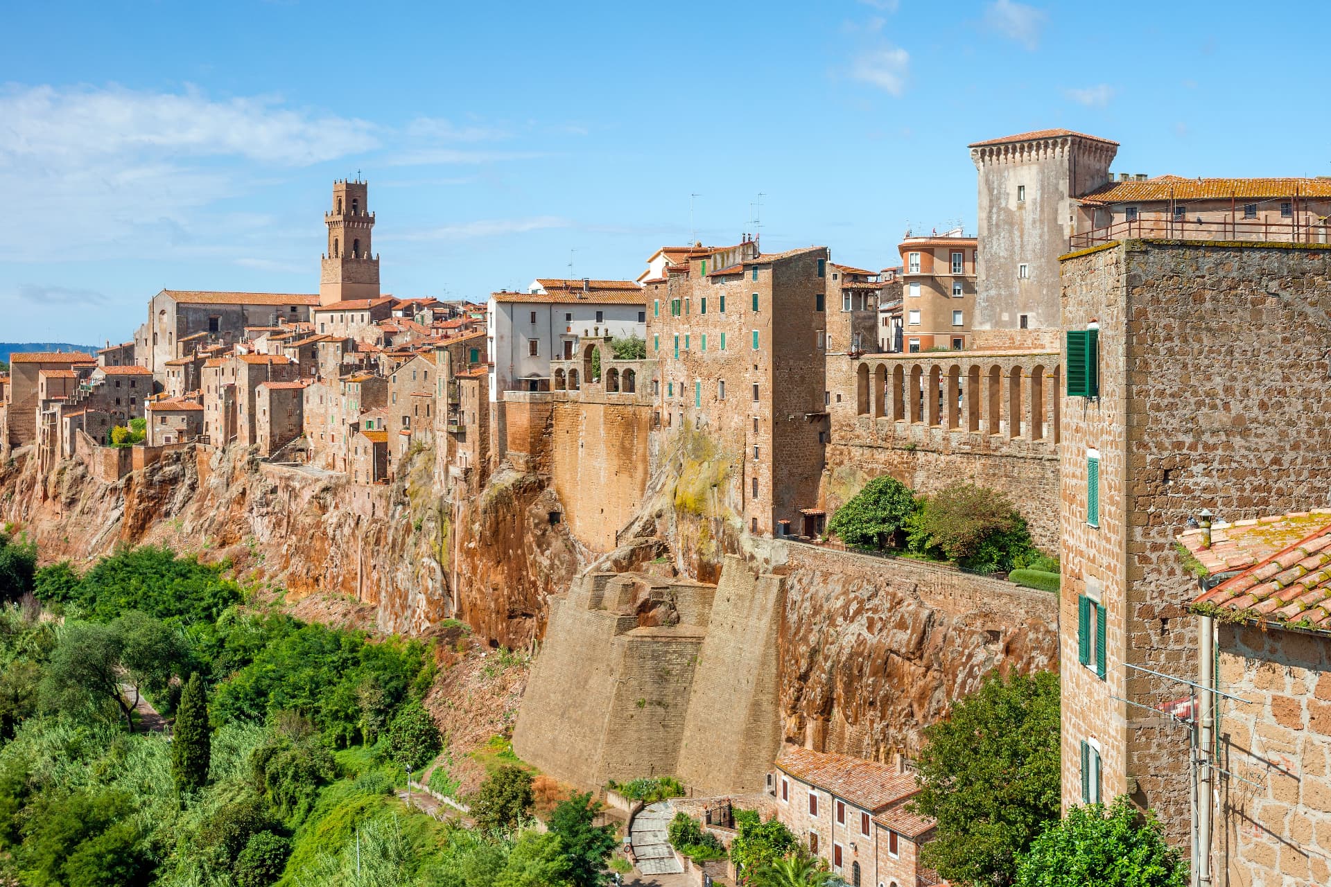 Pitigliano's walls, arcaded aqueduct and towers rising straight out of the rock