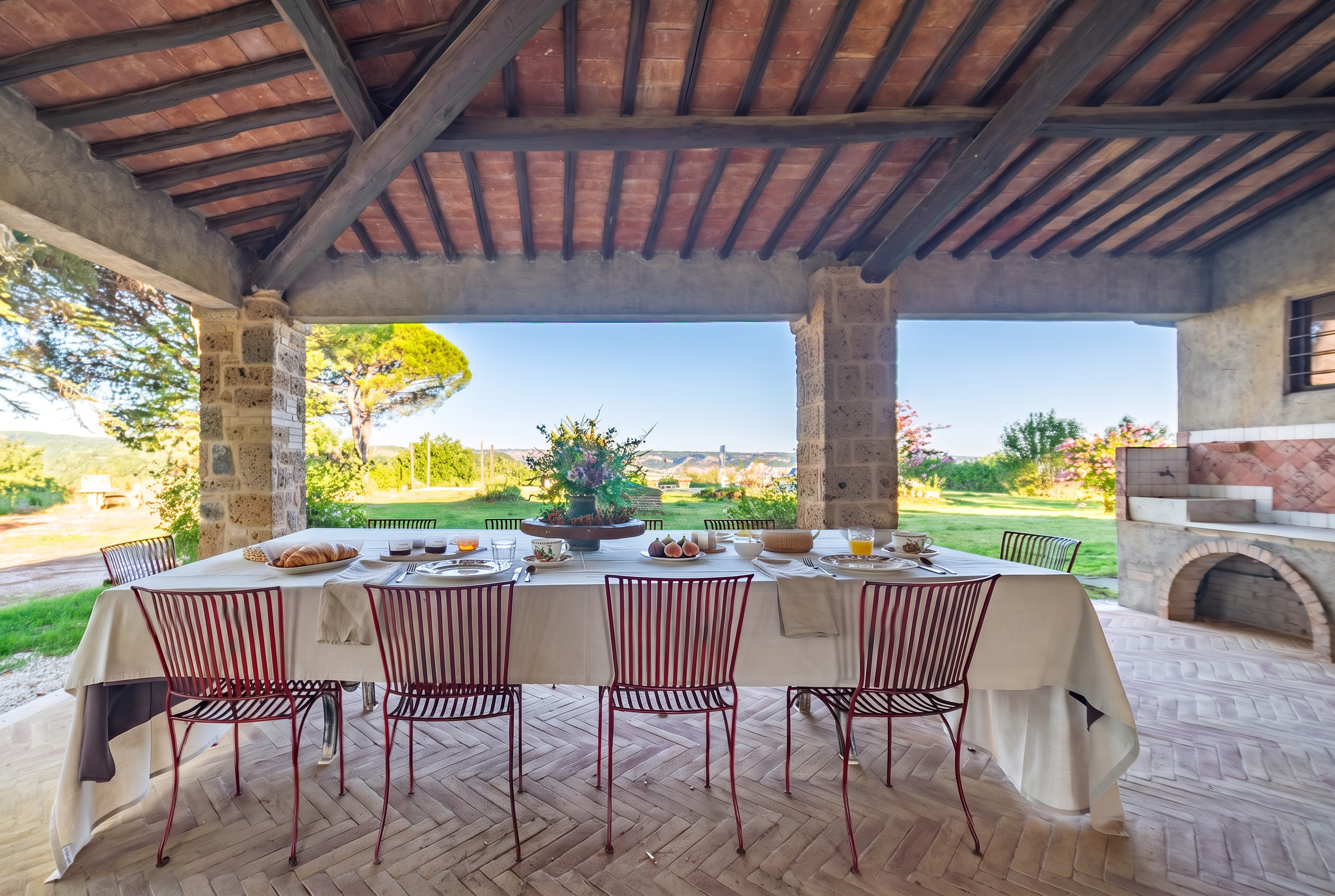 The portico table laid for a rustic, elegant breakfast